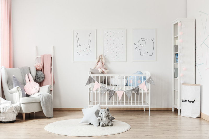 Baby's room with grey armchair
